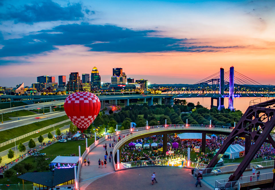 Louisville skyline at dusk, event at Waterfront Park