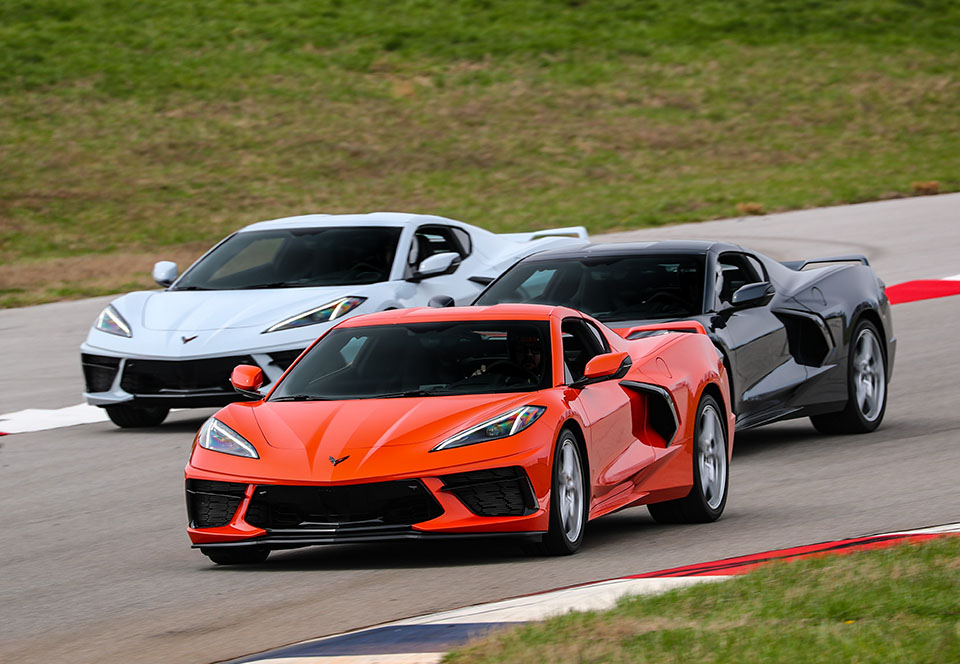 Three Corvettes racing